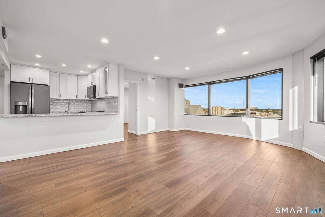 Welcome to 127 Greyrock Place, Unit 1712, an exceptional 17th floor TOP floor corner unit at The Biltmore with breathtaking panoramic views of the city skyline and Long Island Sound.