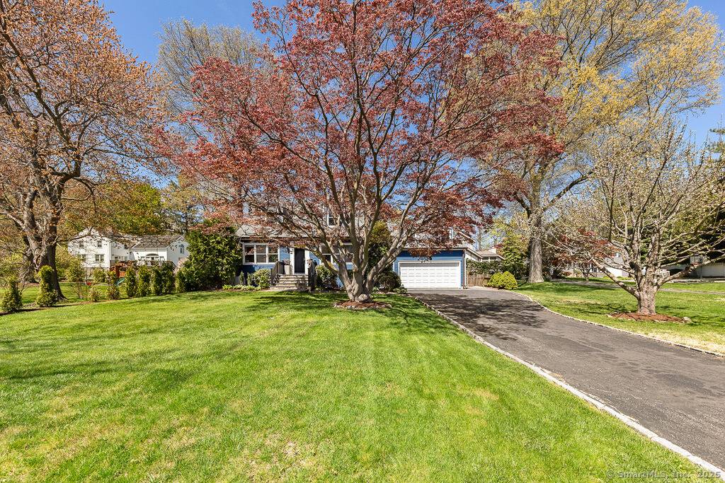 Step inside this fully renovated and modern Cape nestled on a quiet street in a sought after neighborhood in the Hindley Elementary School district.