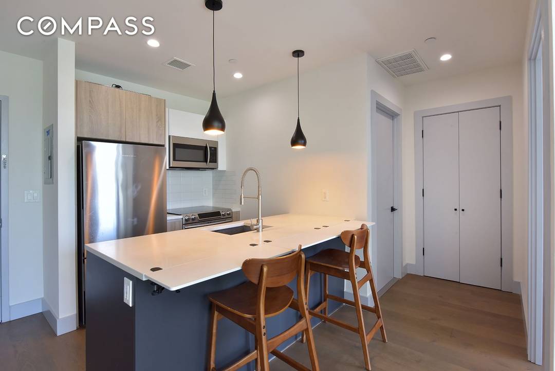 Beautifully renovated 2 bedroom condo featuring an open concept layout with floor to ceiling windows and sunny southern exposure.