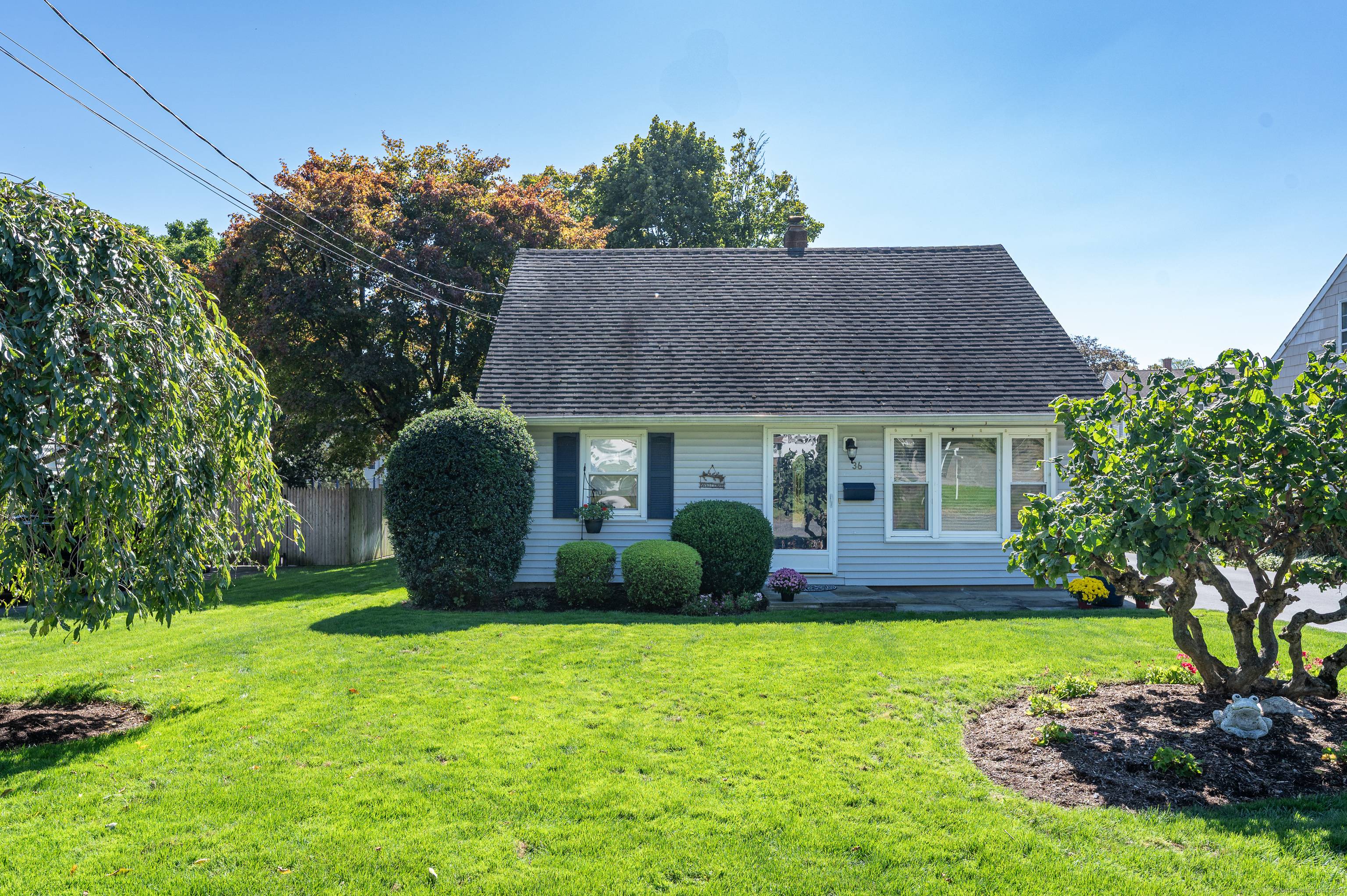 A charming 4 bedroom Cape Cod style home with an open floor plan.