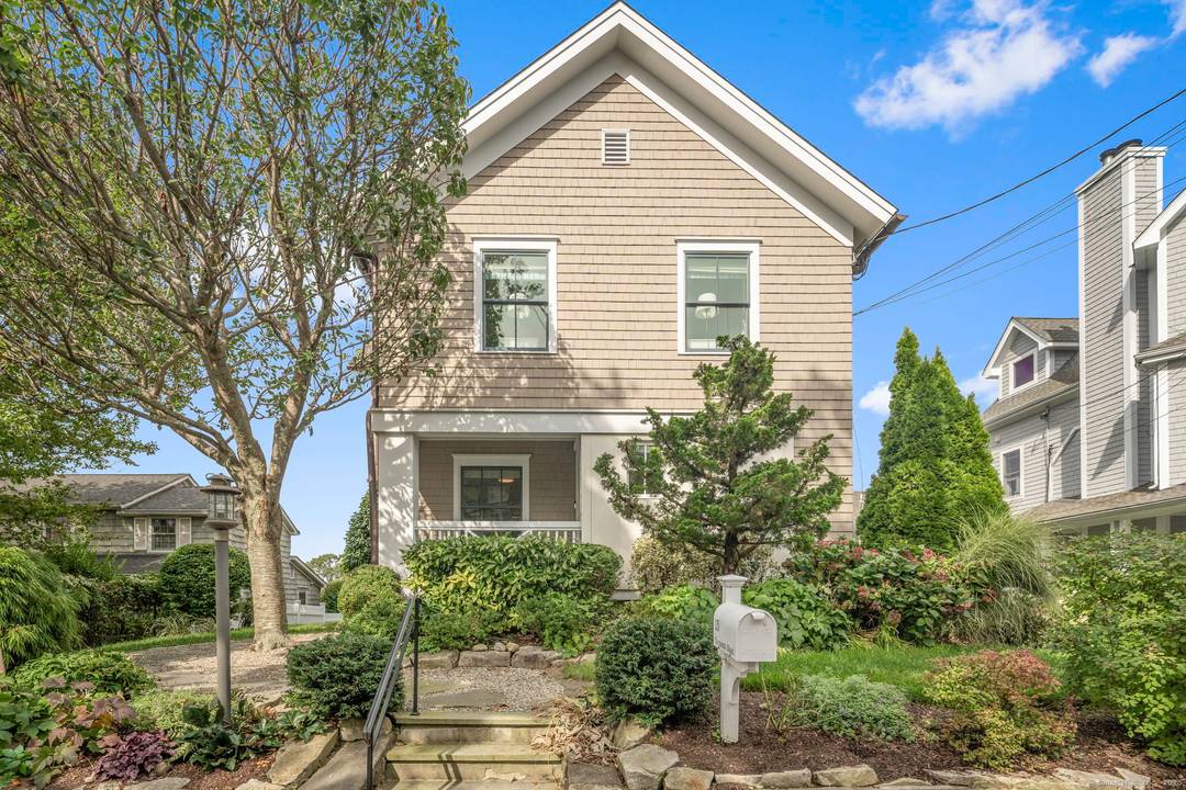 Perched on one of Bell Island's most coveted elevated sites, this exceptional residence commands panoramic waterfront views while offering complete privacy in this community.