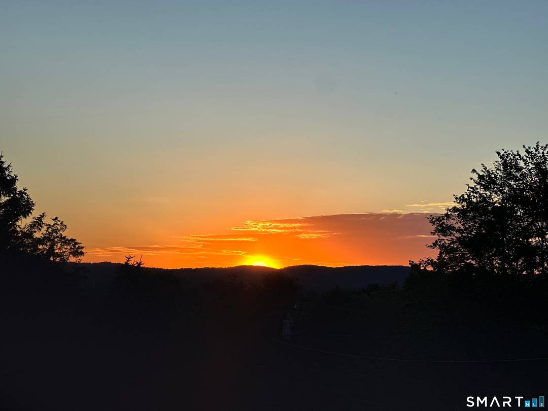 Desirable CHIMNEY HEIGHTS Enjoy YEAR ROUND SUNSET VIEWS and distant city Views from this updated Raised Ranch.