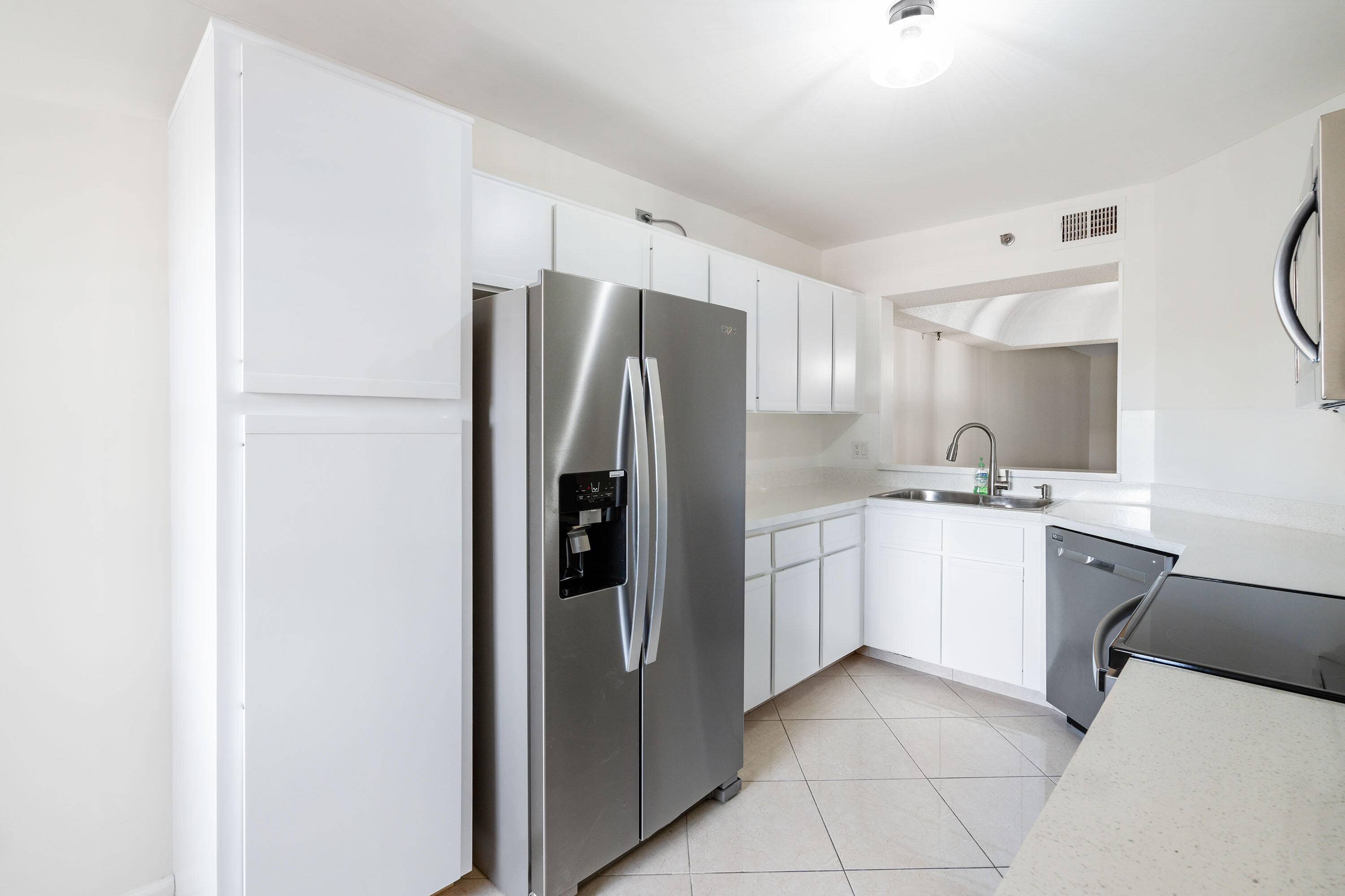Welcome to this beautiful 2 bedroom, two bathroom condo in the Pines of Boca Raton Barwood.
