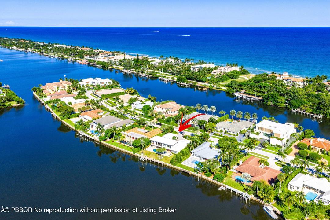 Set along the tranquil waters of prestigious Manalapan, this completely reimagined waterfront estate defines luxury family living.