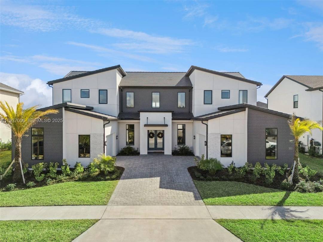 Welcome to refined luxury living at 9320 Laurel Berry Drive, an elegant contemporary residence designed for both sophistication and comfort.