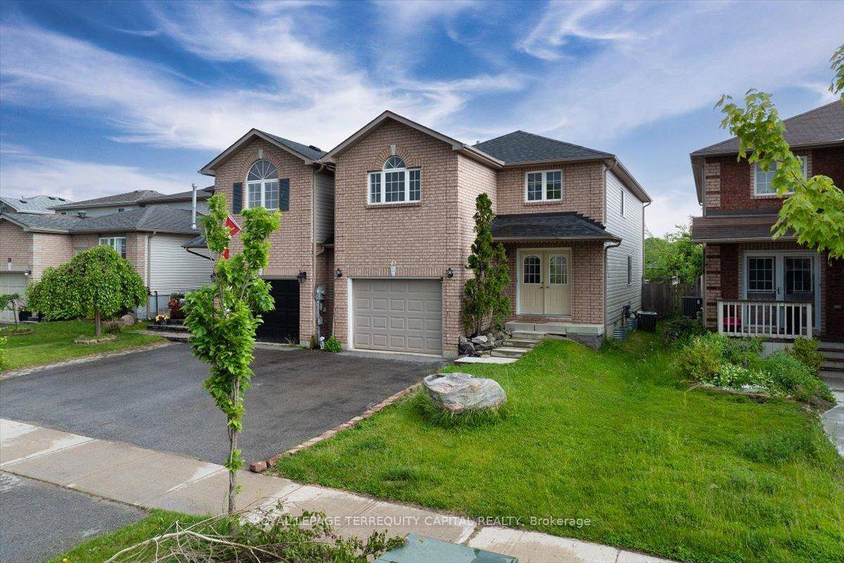 Spacious 4 1 Bedroom Family Home with Finished Basement and Oversized Garage !