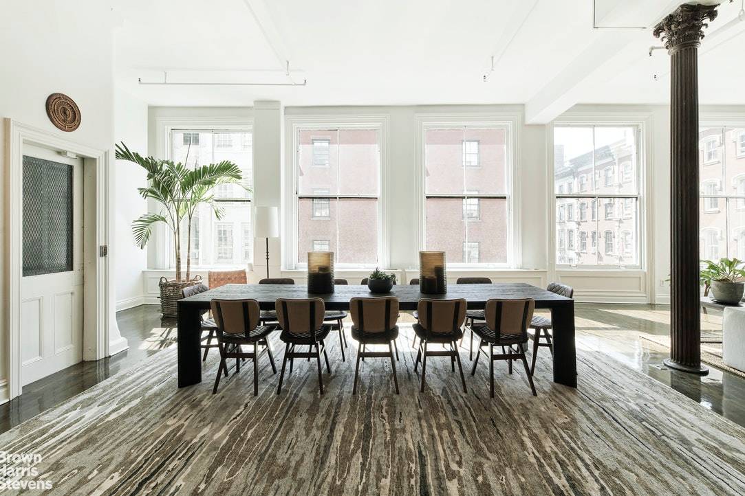 This chic quintessential prewar loft located in a prime Soho boutique condominium features over 4000 square feet with soaring 13 foot ceilings.