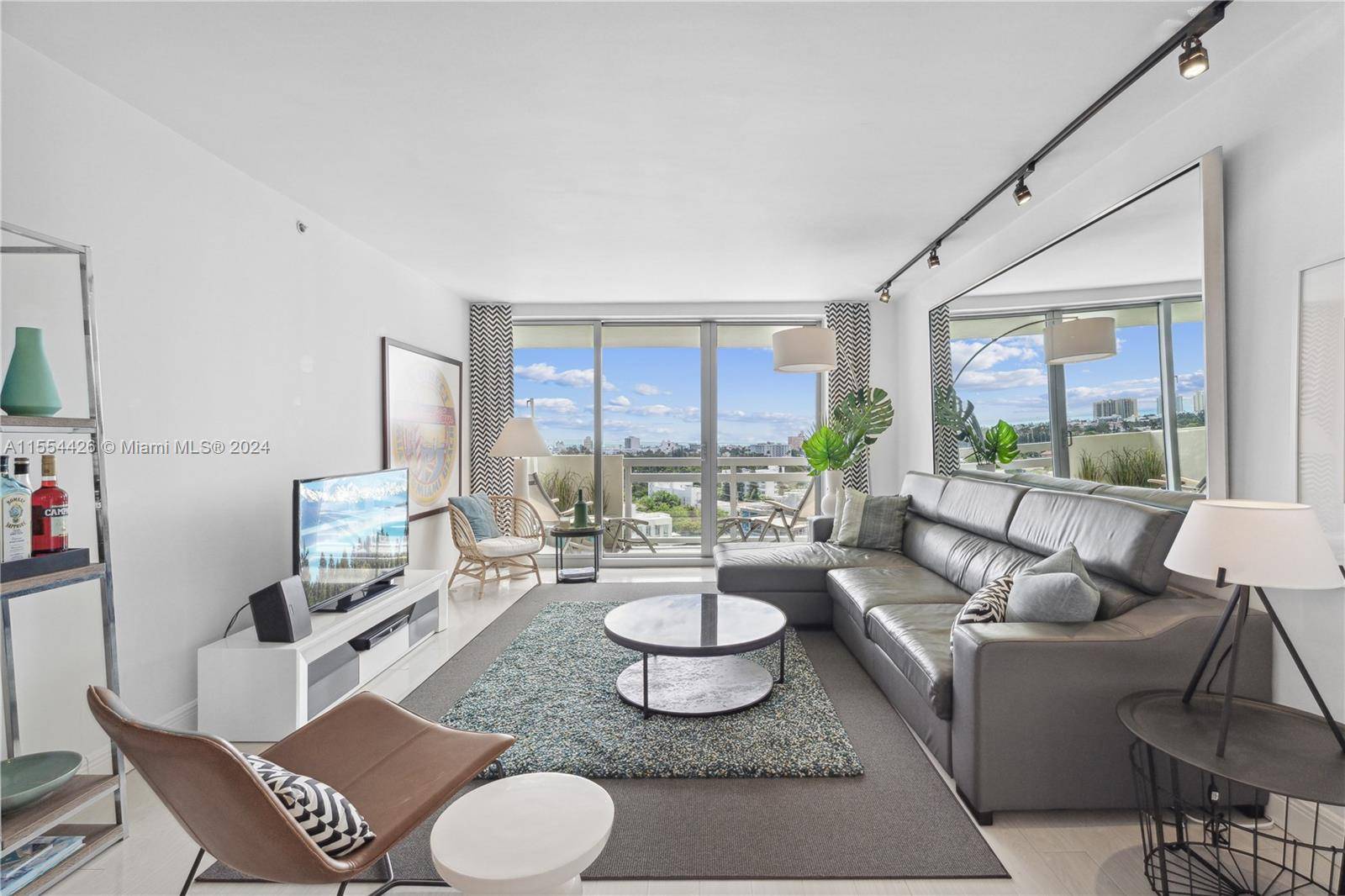 Fully furnished, renovated designer unit with gorgeous unobstructed breathtaking ocean and skyline views from the lower penthouse.