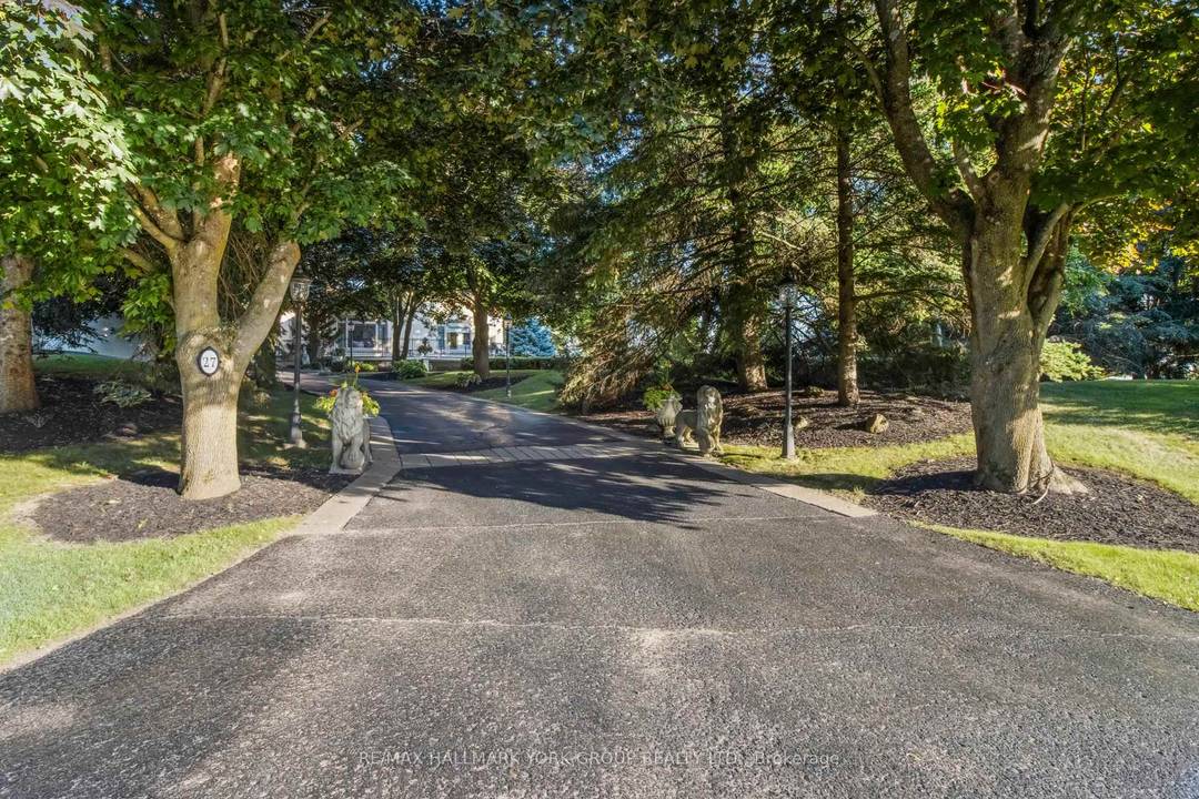 Set on a beautifully secluded two acre property, this exceptional walk out bungalow offers an elegant blend of luxury, comfort, and thoughtful design.
