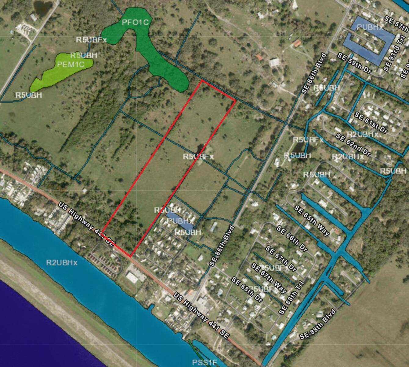 21. 8 acres zoned ag in county recreational corridor.