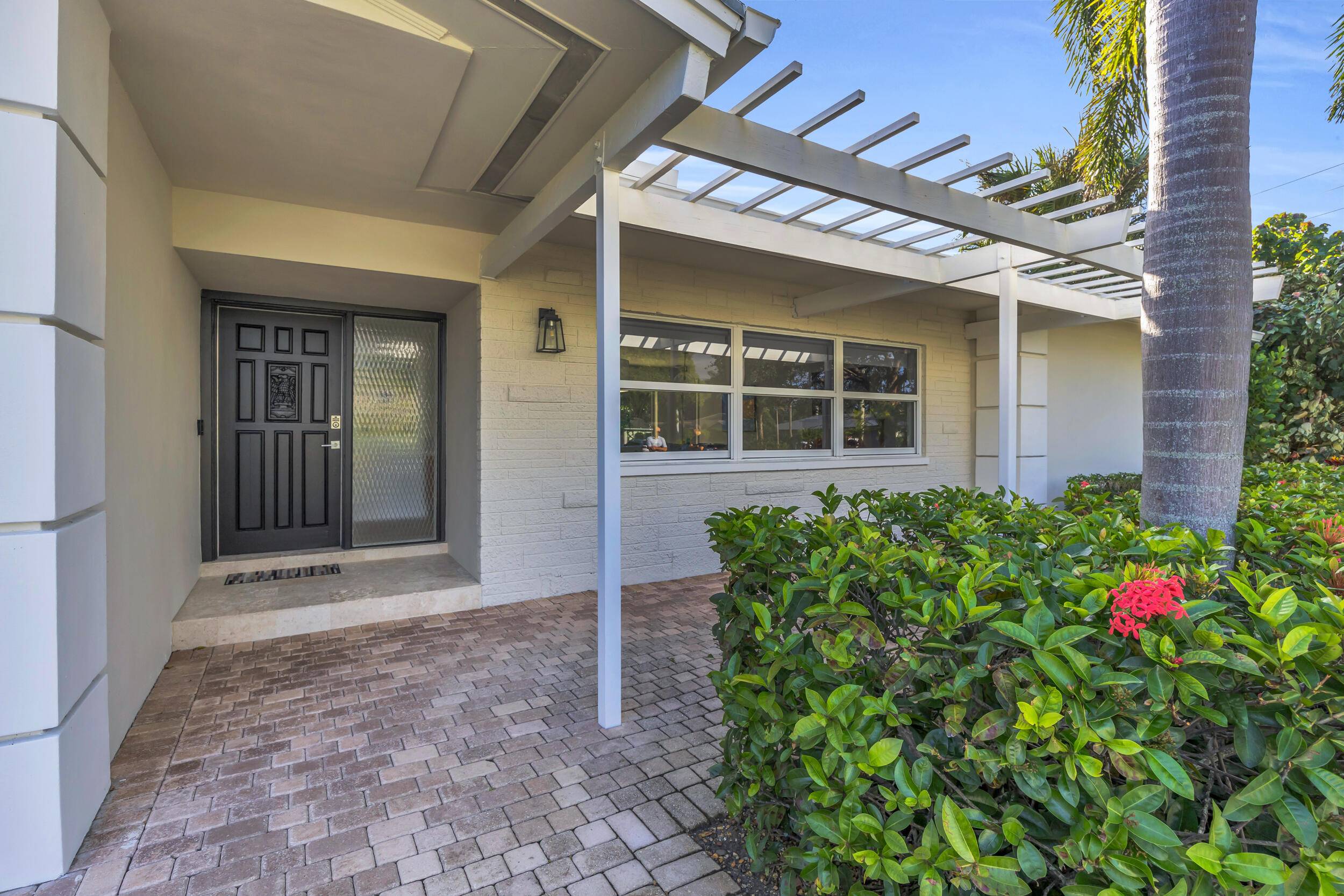 Charming and well located CBS home in popular Tequesta Country Club.