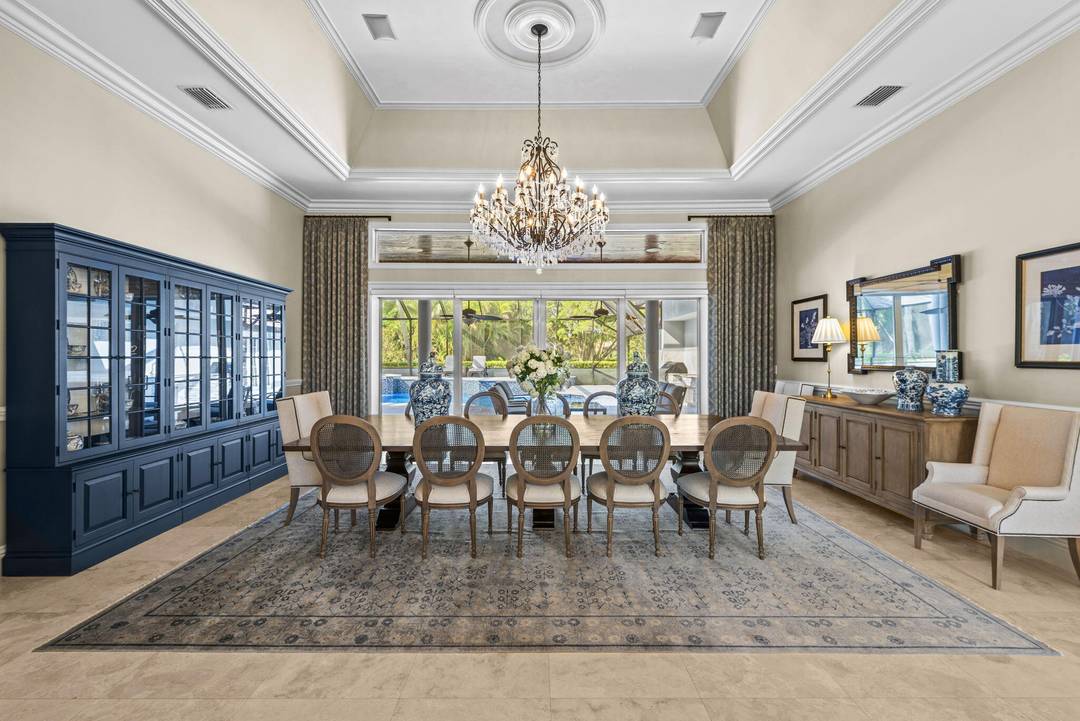 I'm delighted to introduce you to this immaculately maintained and thoughtfully upgraded home in the prestigious Cypress Head community.