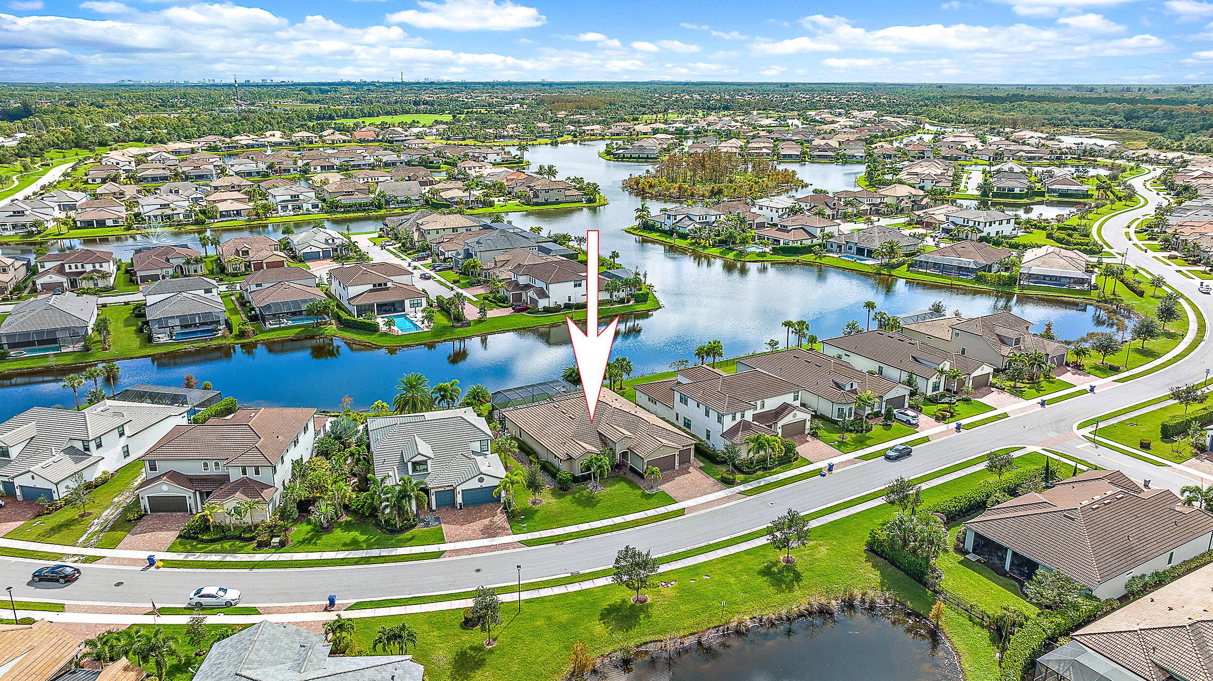 Presenting a stunning five bedroom plus den smart home nestled on one of the most coveted lots in Sonoma Isles, Jupiter.