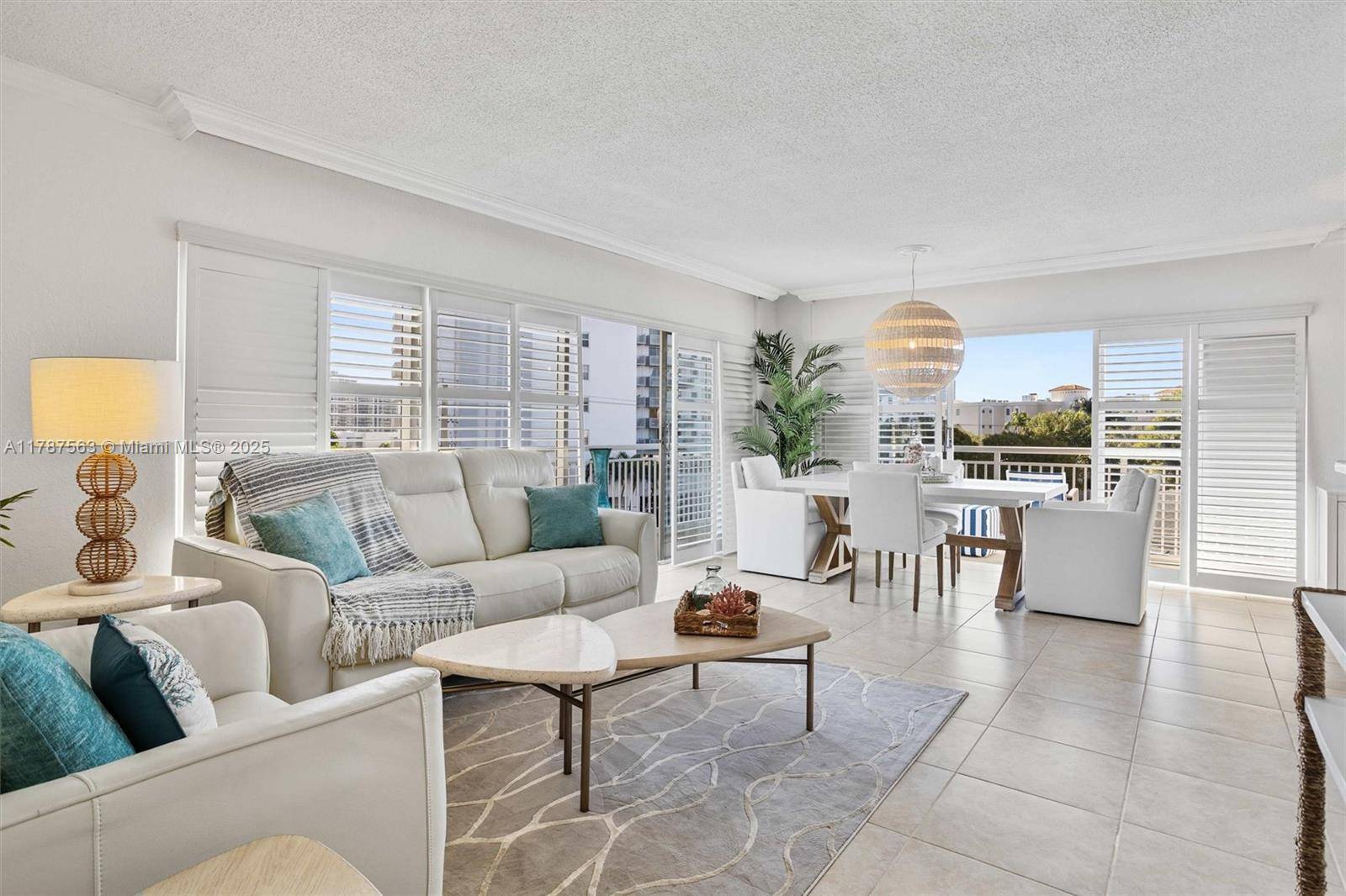 Waterfront living in this beautifully updated 2 bedroom, 2 bath corner unit located in a boutique style building with only four units per floor.