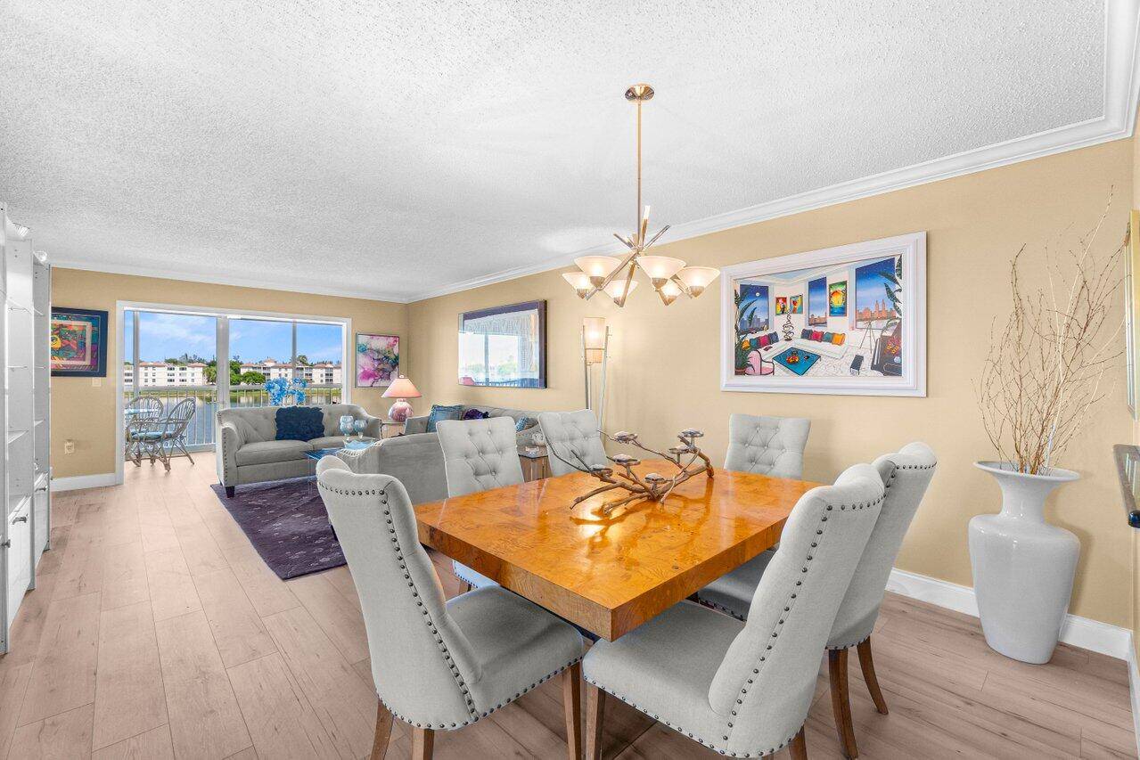 COME SEE THIS COMPLETELY UPDATED CORNER PENTHOUSE CONDO w STUNNING LAKE VIEWS !