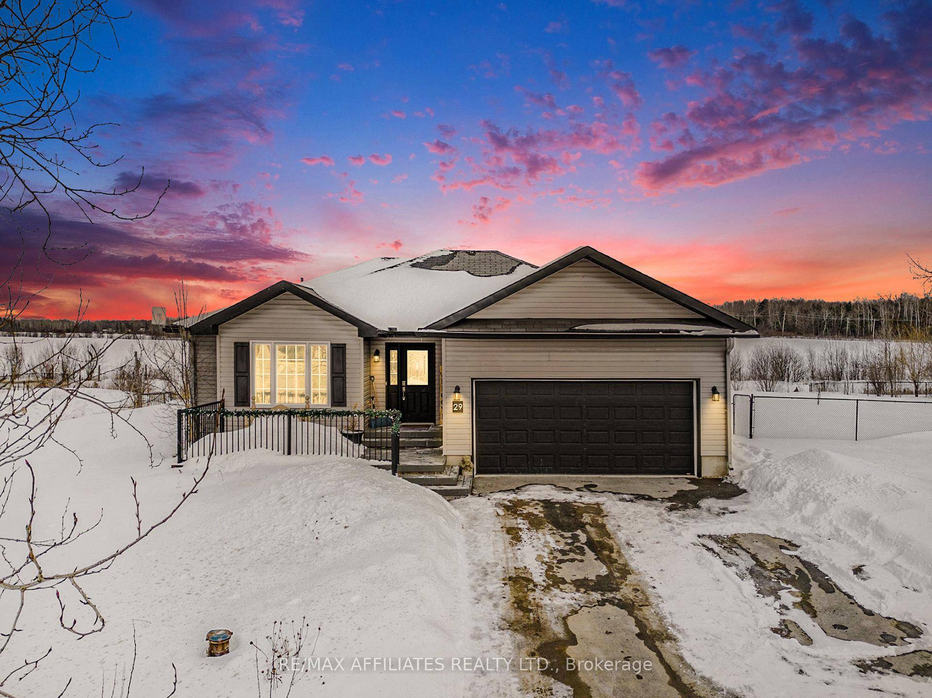 Experience comfortable living in this beautifully maintained bungalow, set on a spacious 1 acre lot in a desirable neighborhood.
