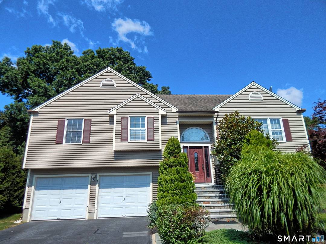 Few homes compare to this exquisite raised ranch, ideally situated on a quiet cul de sac in a prime commuter location just a 15 minute walk to the Milford Green ...