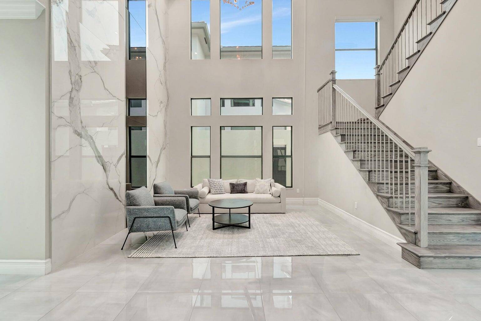 Step into refined living with this beautifully enhanced estate in the Boca Bridges.