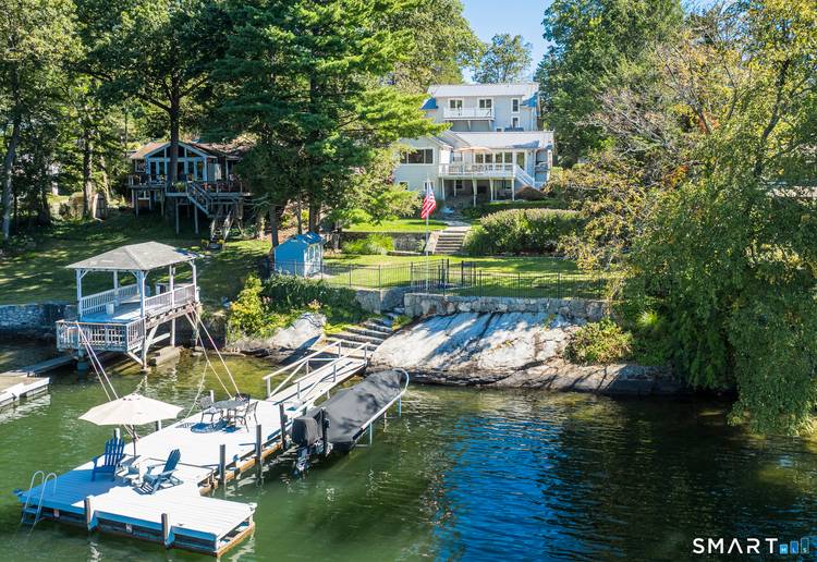 Spectacular Direct Waterfront on Candlewood Lake located in southern New Milford within highly desirable Candlewood Point private community.