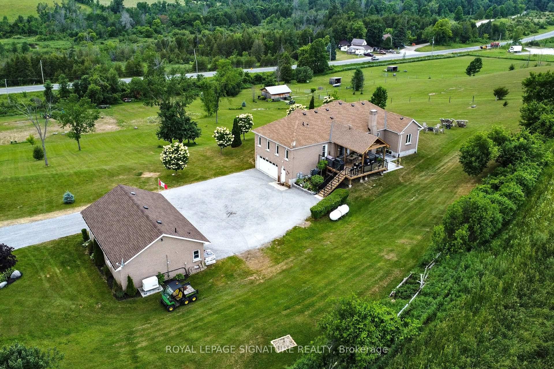 Impressive 36'x24' Detached Heated Garage Workshop with 9'x9' Roll up Door, Propane Furnace amp ; 3pc Bath, plus a Barn with Hydro, 2 Box Stalls, 2 Water Hydrants, Fencing, Shelters, ...