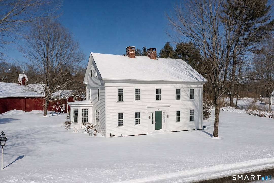 Beautifully set along the banks of the Pomperaug River, this timeless ca1782 Colonial is truly exceptional and set in the White Oak section of Woodbury.