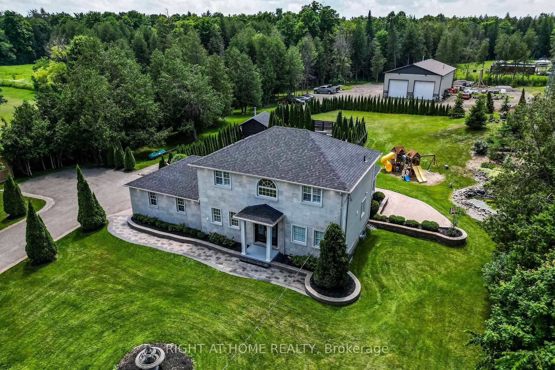 Welcome To 13640 Guelph Line, A Stunning Custom Estate Nestled On 2 Serene Acres !