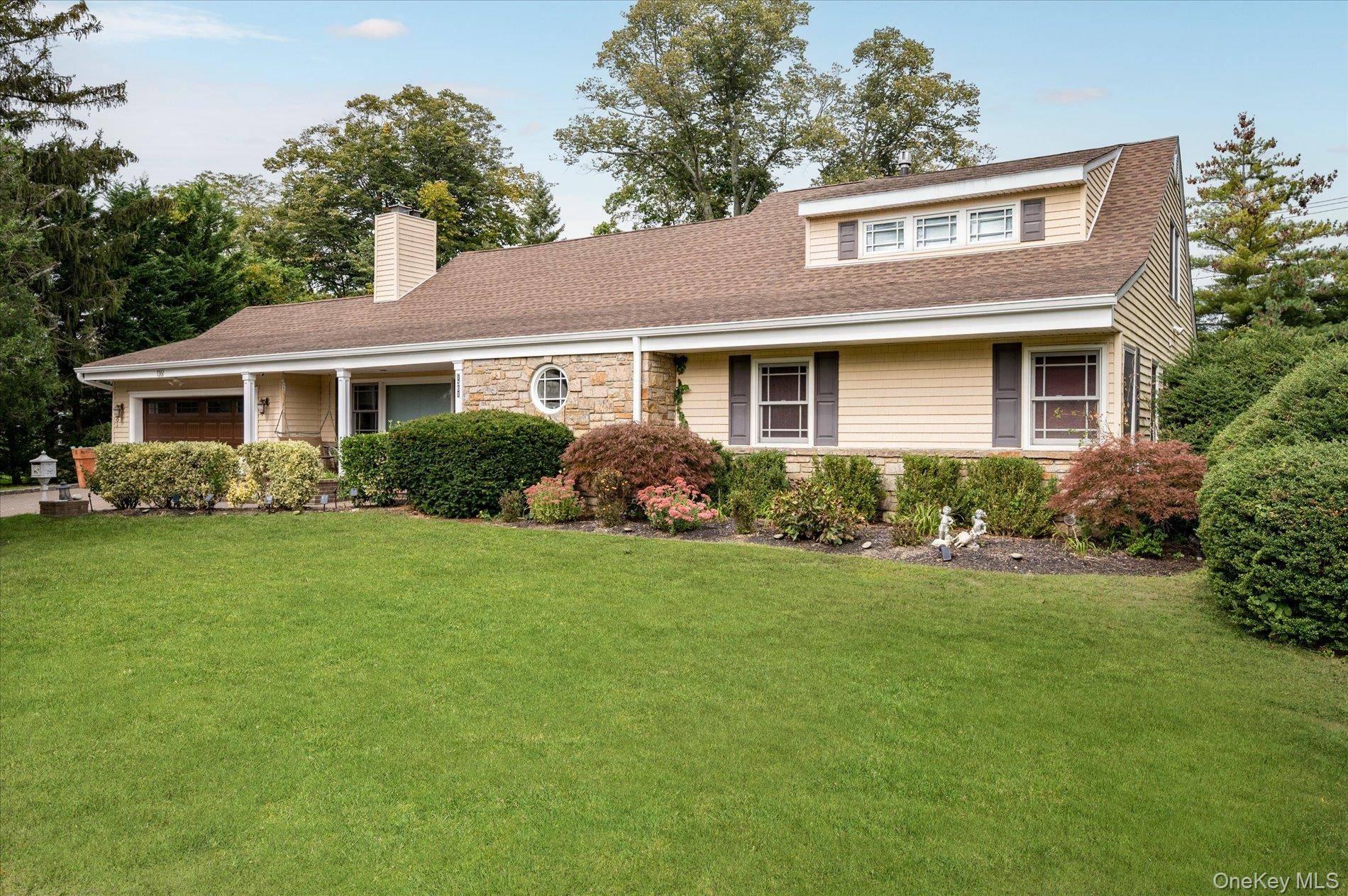 Welcome to Hewlett Harbor, this sprawling 5 bedroom, 4 bath Expanded Ranch in desirable School District 14.