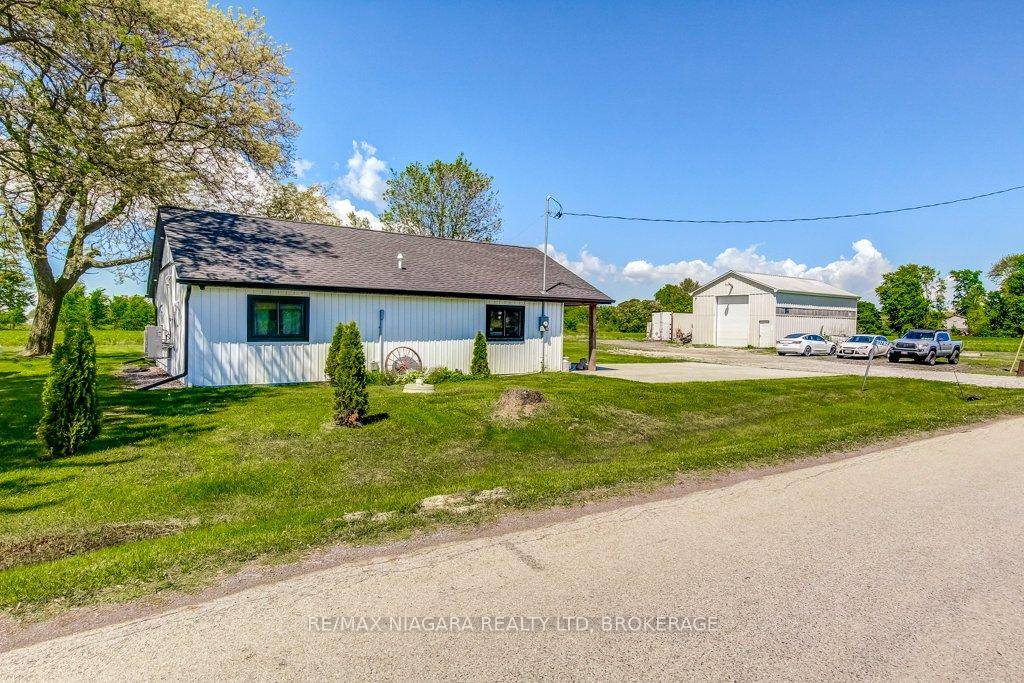 Welcome to this beautifully updated 2 bedroom bungalow, where modern farmhouse style meets serene country living.