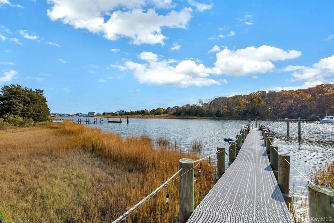 Set along one of Mattituck s most sought after waterfront enclaves, 2280 Deep Hole Drive offers a rare opportunity to own an exquisite waterfront residence newly built in 2022, encompassing ...