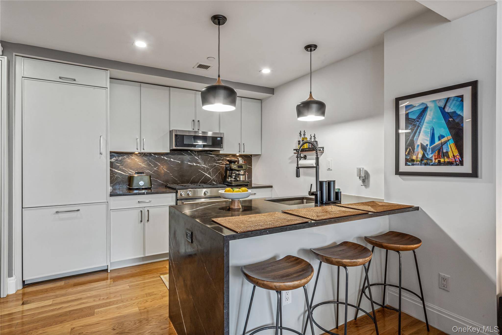 Step into luxury with this stunning, thoughtfully designed residence featuring high end finishes and seamless indoor outdoor living.