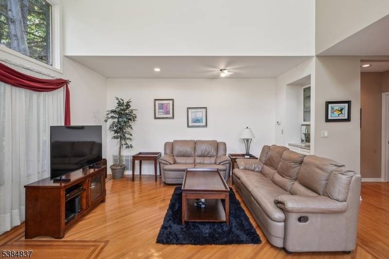A RARE FIND ! This pristine private corner townhouse offers a first floor primary bedroom, two additional large bedrooms, and an oversized loft which can easily be a 4th bedroom ...