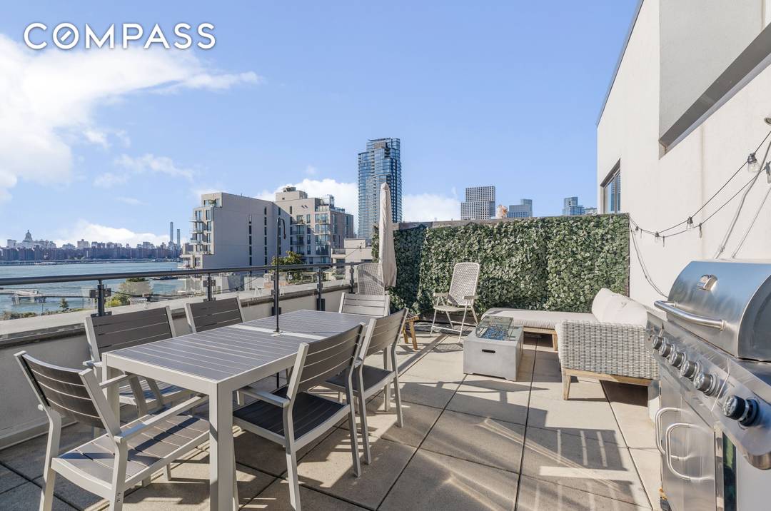 This luxurious two bedroom, two bathroom penthouse offers an expansive terrace with sweeping views of the East River and the Manhattan skyline.
