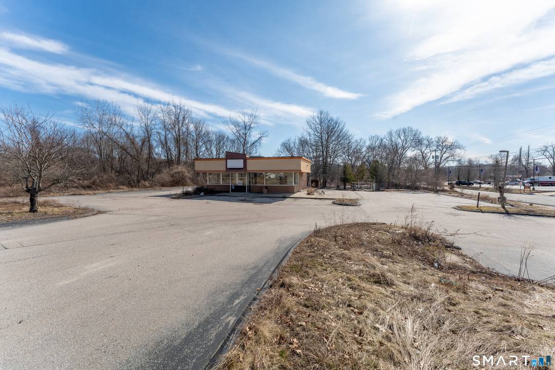 Positioned along highly traveled Route 32, this former Dunkin' Donuts property presents a prime commercial redevelopment or owner user opportunity in a high visibility location.