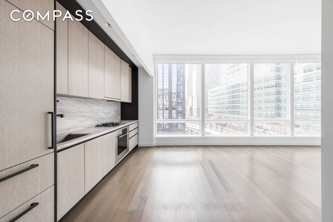 At 755 square feet, this oversized alcove studio residence offers exceptional proportions, refined design, and south facing exposures with ceilings soaring up to approximately 10'7.