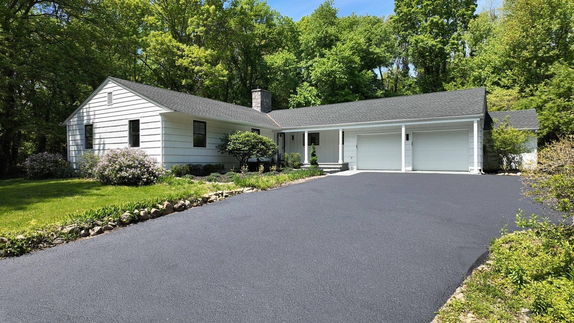 This immaculately renovated Ranch is set on 2.