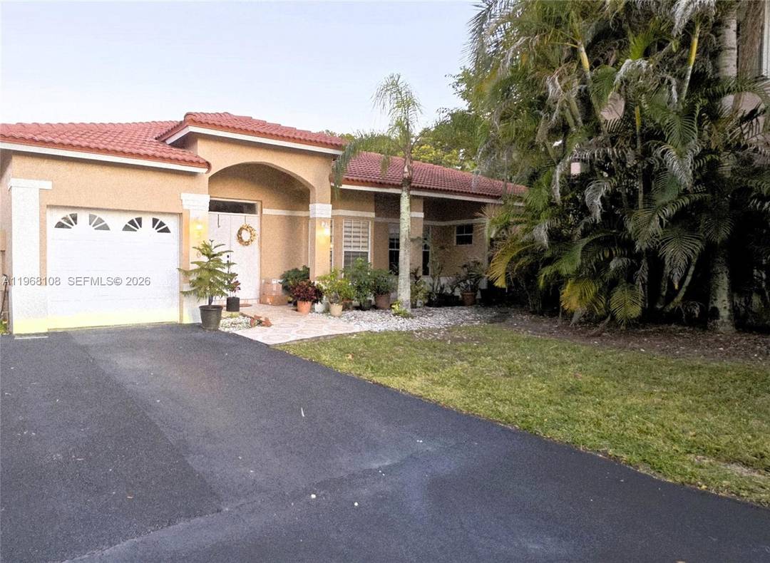 Stunning corner single family home located in Doral Pines, one of the 13 exclusive communities within prestigious Doral Park.