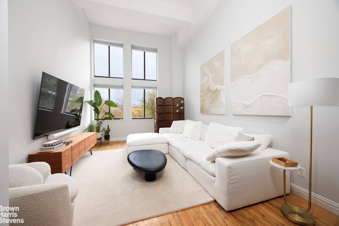 Classic duplex loft with open east exposures is a perfect start to describing this spacious and dramatic 1 bedroom, 1.