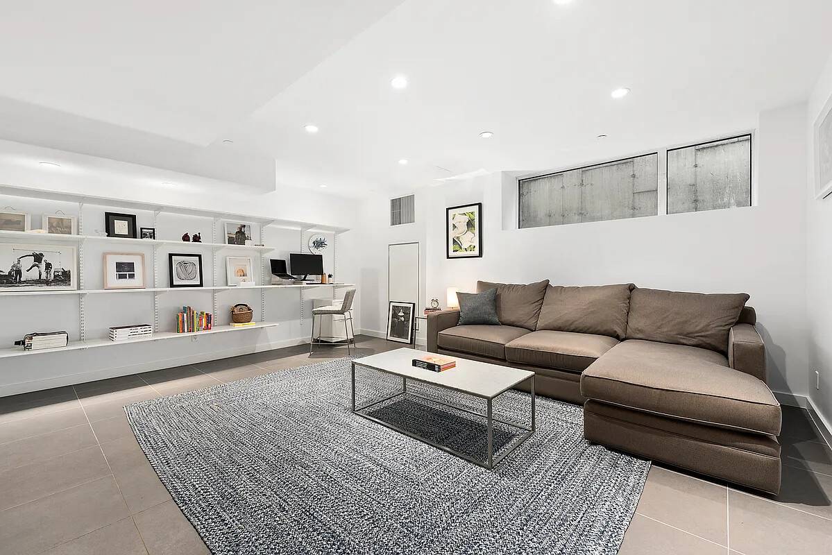 Set in a contemporary condominium one block from McCarren Park, this impeccably designed duplex apartment spans 1, 164 square feet and features wide plank hardwood floors, oversized windows, and high ...