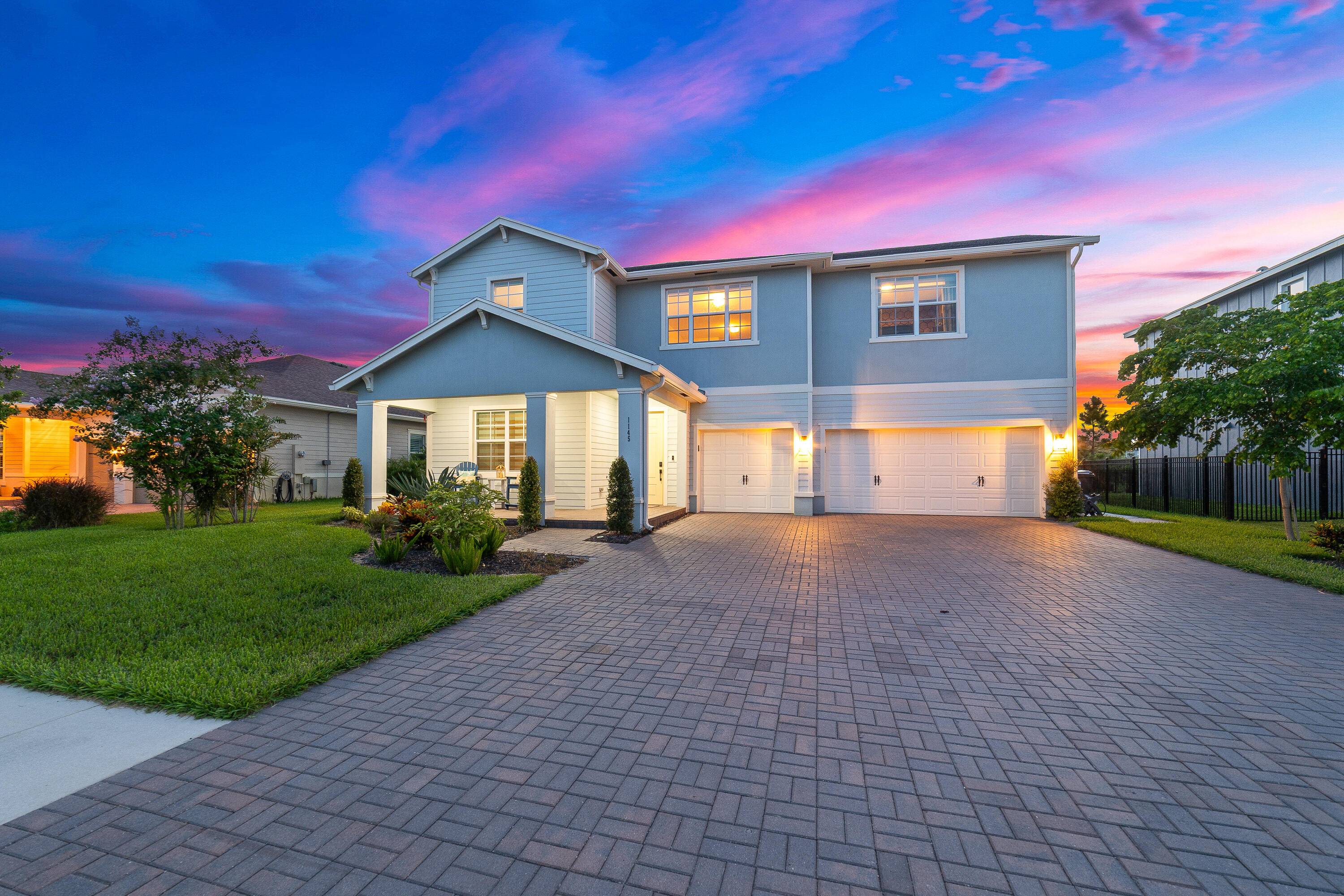 Modern. Grand. Gorgeous. Prepare to be impressed by soaring ceilings, abundant natural light, and custom built ins strategically installed for maximum use of a mudroom and laundry space.