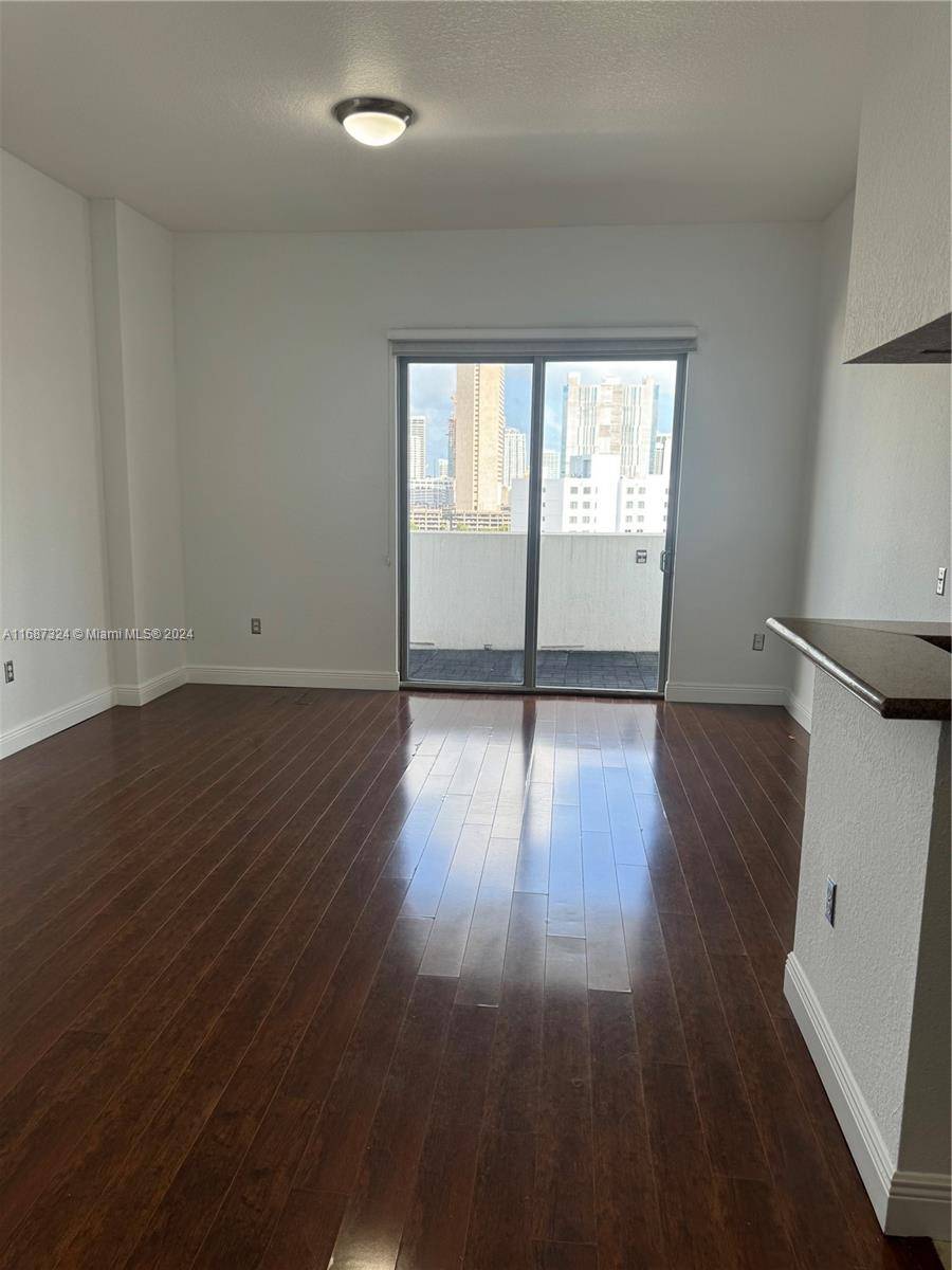 This bright freshly painted and well maintained 2 bedroom, 2 bathroom unit features high ceilings and a wrap around balcony offering great views.