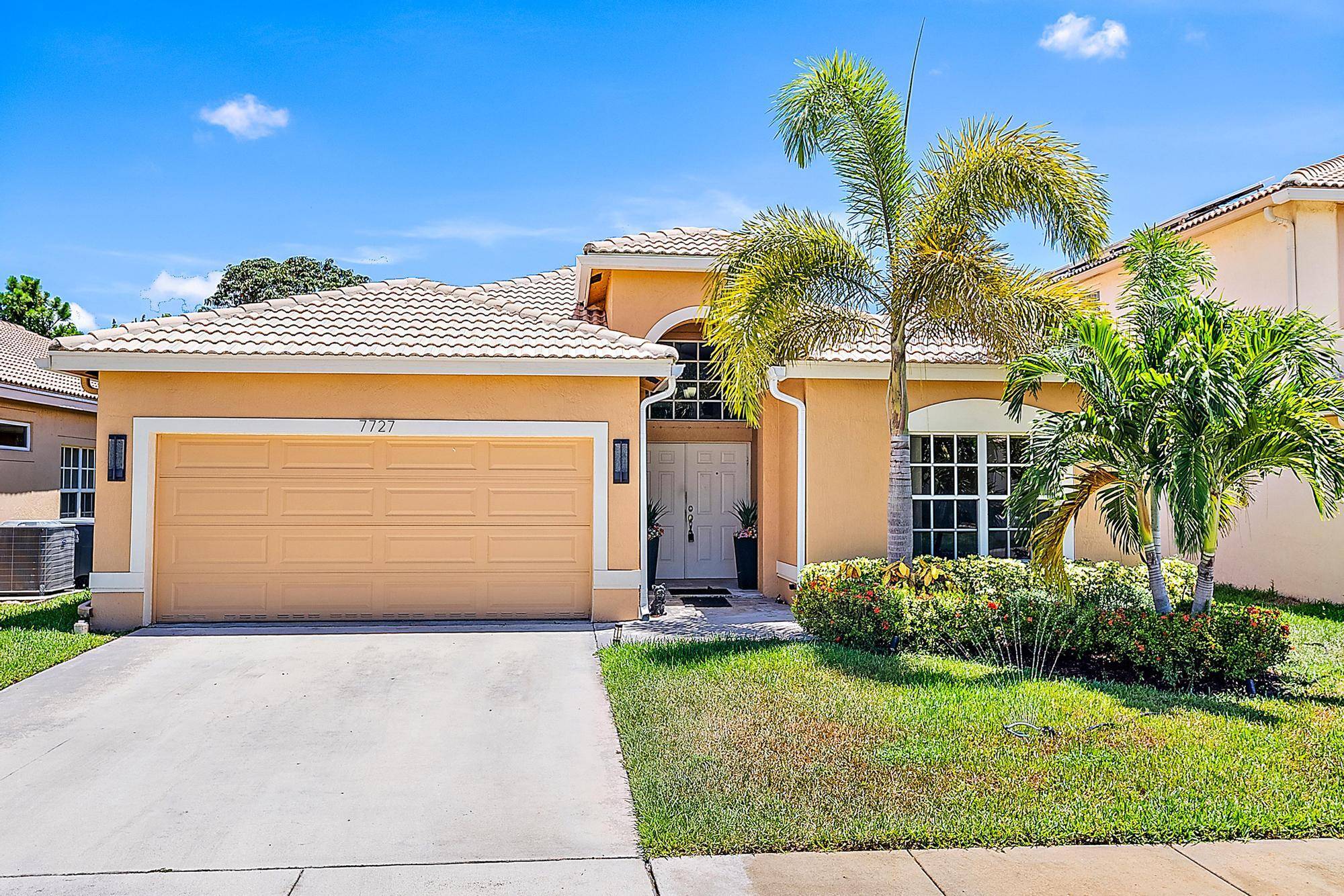 Welcome to 7727 Colony Lake Drive an upgraded 3BR 2BA home in a gated Boynton Beach community with low HOA.