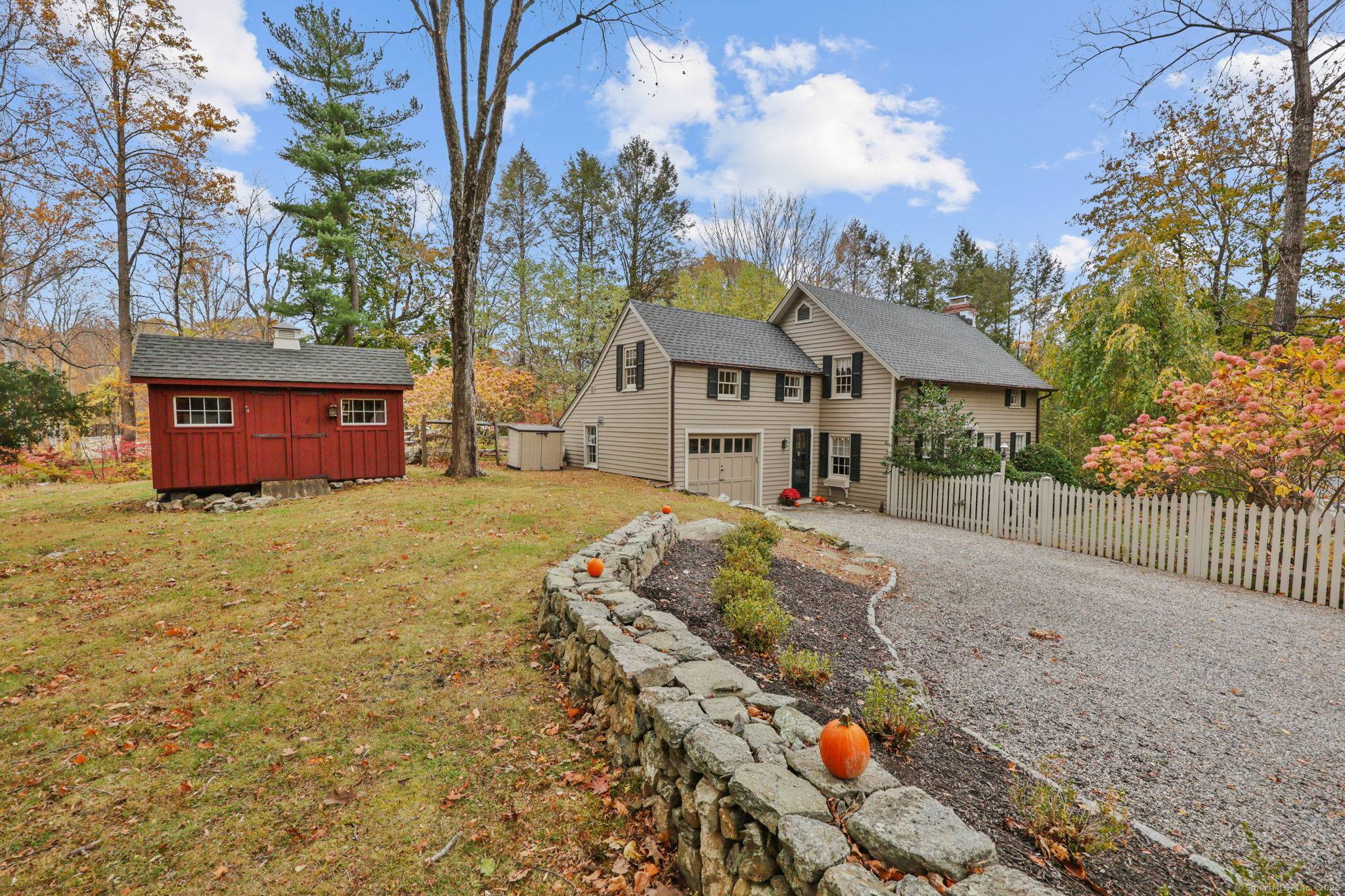 Exceptional three bedroom antique Colonial exudes tremendous curb appeal on 1.