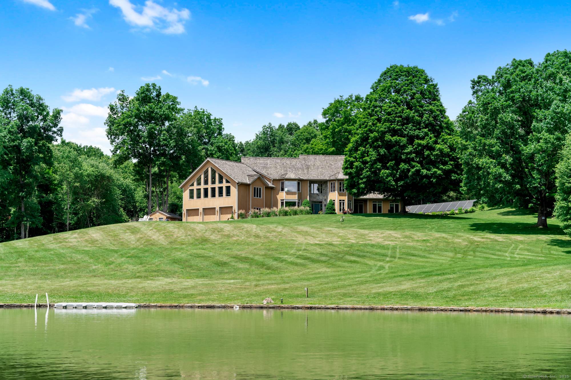 Exceptionally constructed contemporary set on almost 9 acres with a beautiful view of distant hilltops.