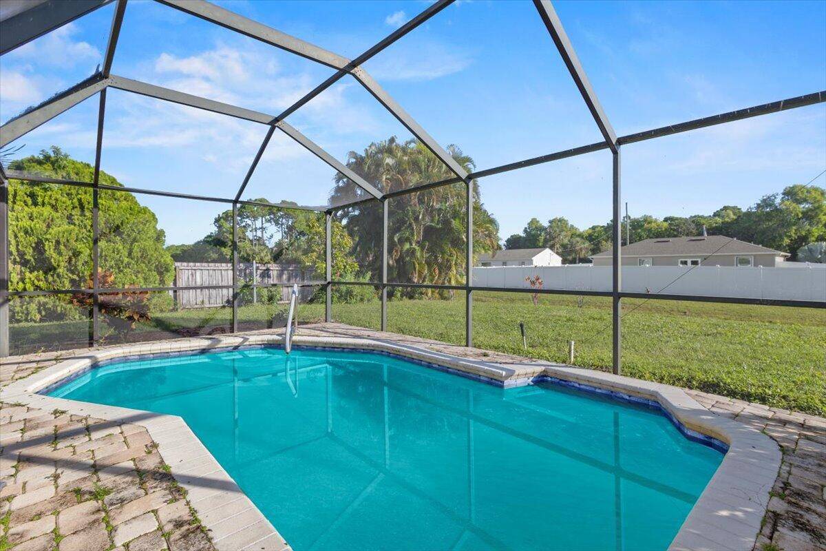 Welcome to this beautifully maintained 3 bedroom, 2 bath pool home, with hurricane impact windows throughout, located just minutes from stunning beaches and convenient access to US 1 for an ...