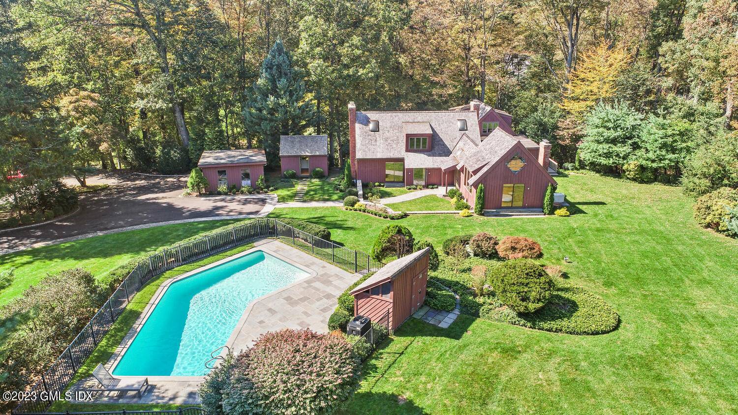 You enter this luxurious oasis through iron gates and down a long driveway to the manicured grounds with your own swimming pool and four season views of Frye Lake.