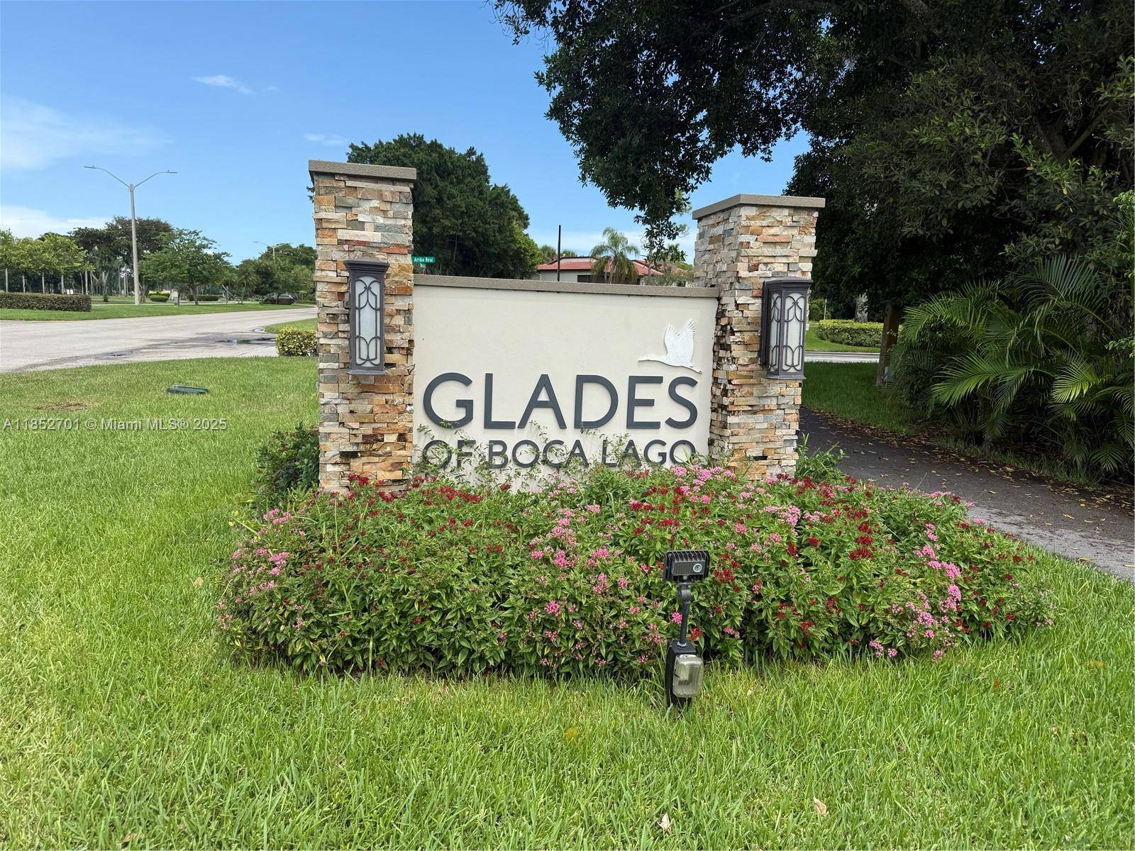 Rarely available 1, 856 Sq Ft corner villa in the prestigious 55 community of Boca Lago.