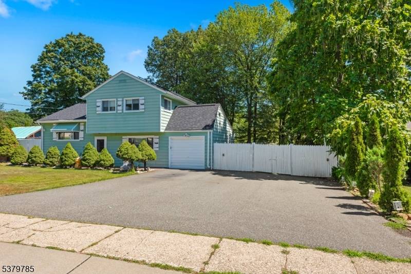 Welcome to this beautifully maintained split level home offering 4 bedrooms and 2 full bathrooms.