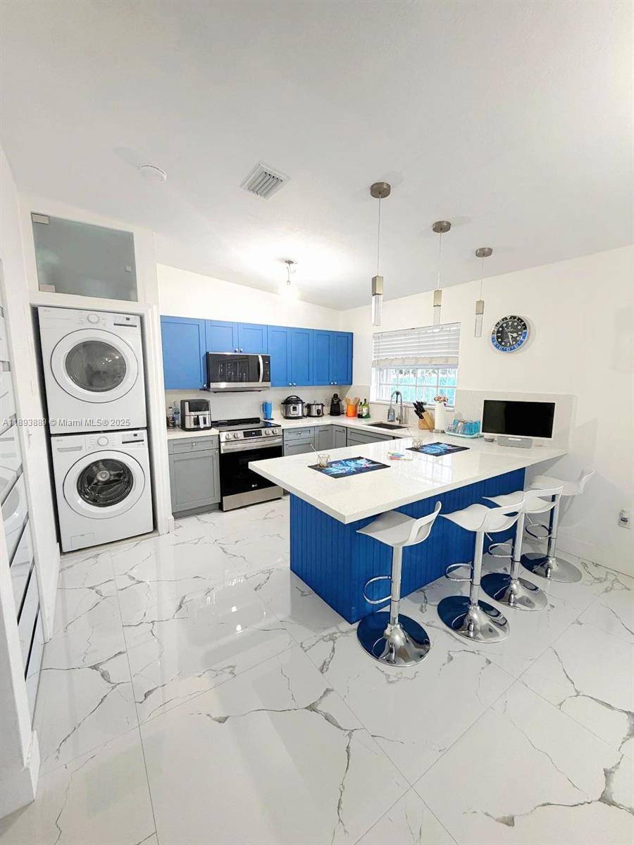 Live the Kendall lifestyle in this beautifully updated one story Condo !