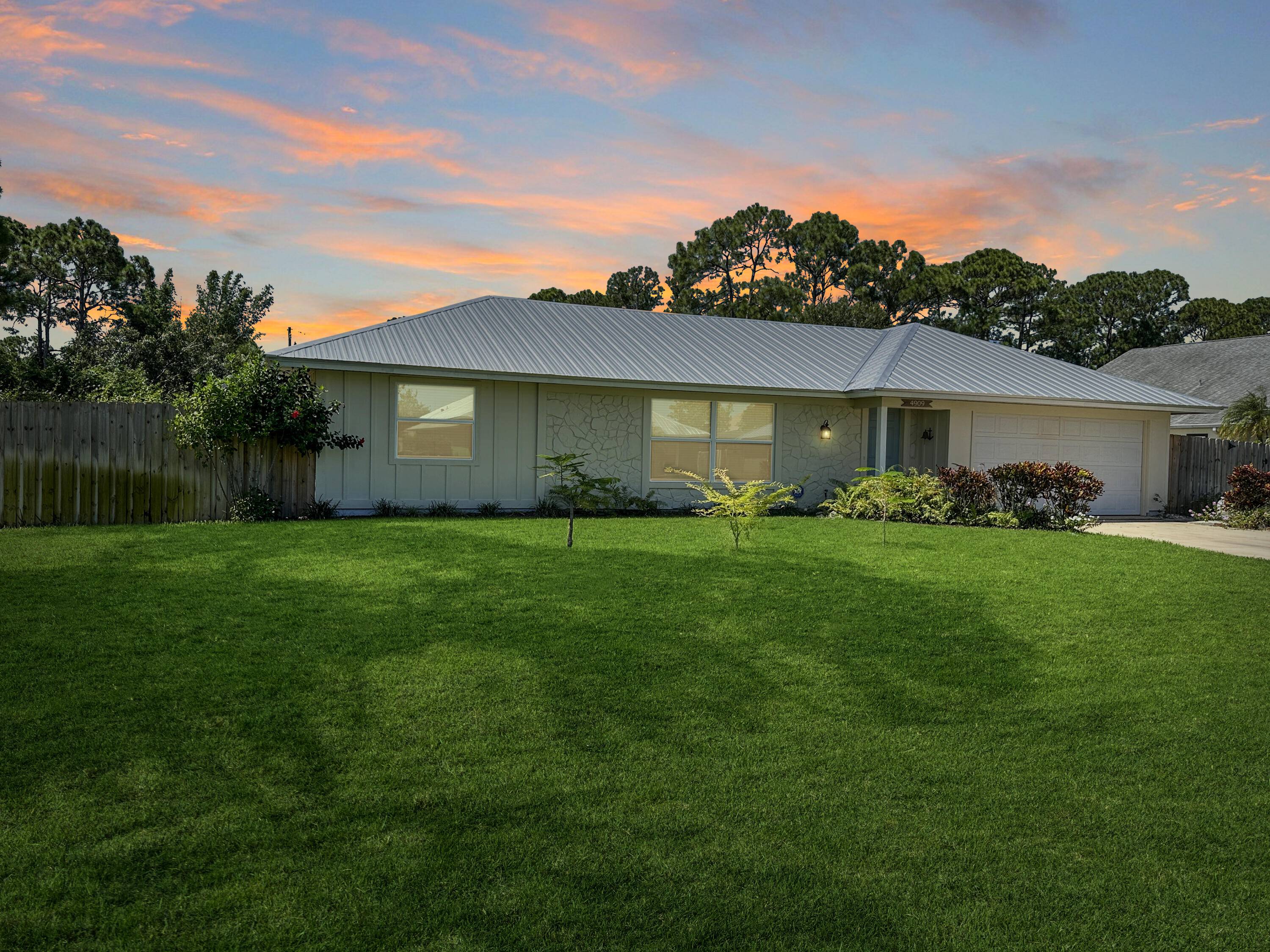 Discover the epitome of Florida living in this stunning single family residence nestled in the sought after Holiday Pines Community.