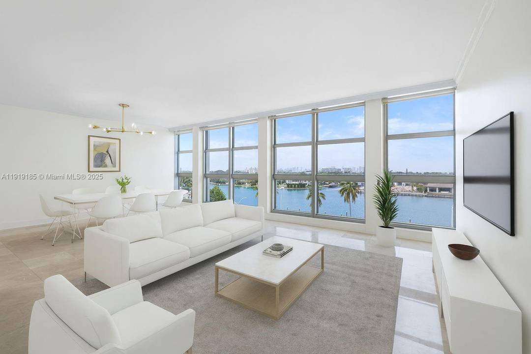 Experience breathtaking intracoastal and downtown Miami views from this spacious Crystal House residence, featuring two bedrooms, three baths, and a versatile third room perfect for a home office or extra ...